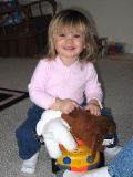 Drew's dump truck is fun to ride.