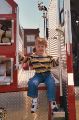 "Look at me, I'm sitting on a REAL fire truck!"