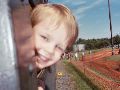 "Look at me... I'm riding on a train behind Thomas!"